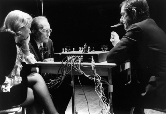 John Cage, Marcel Duchamp, & Teeny Duchamp performing Reunion at its premiere in Toronto, 5th March, 1968. Photograph by Lynn Rosenthal, courtesy of The John Cage Trust.